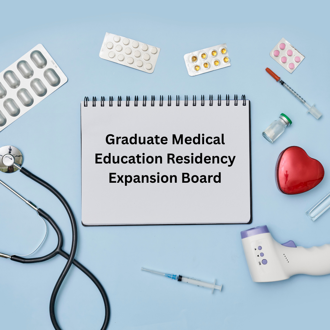 Various medical items surrounding a notebook that says, 